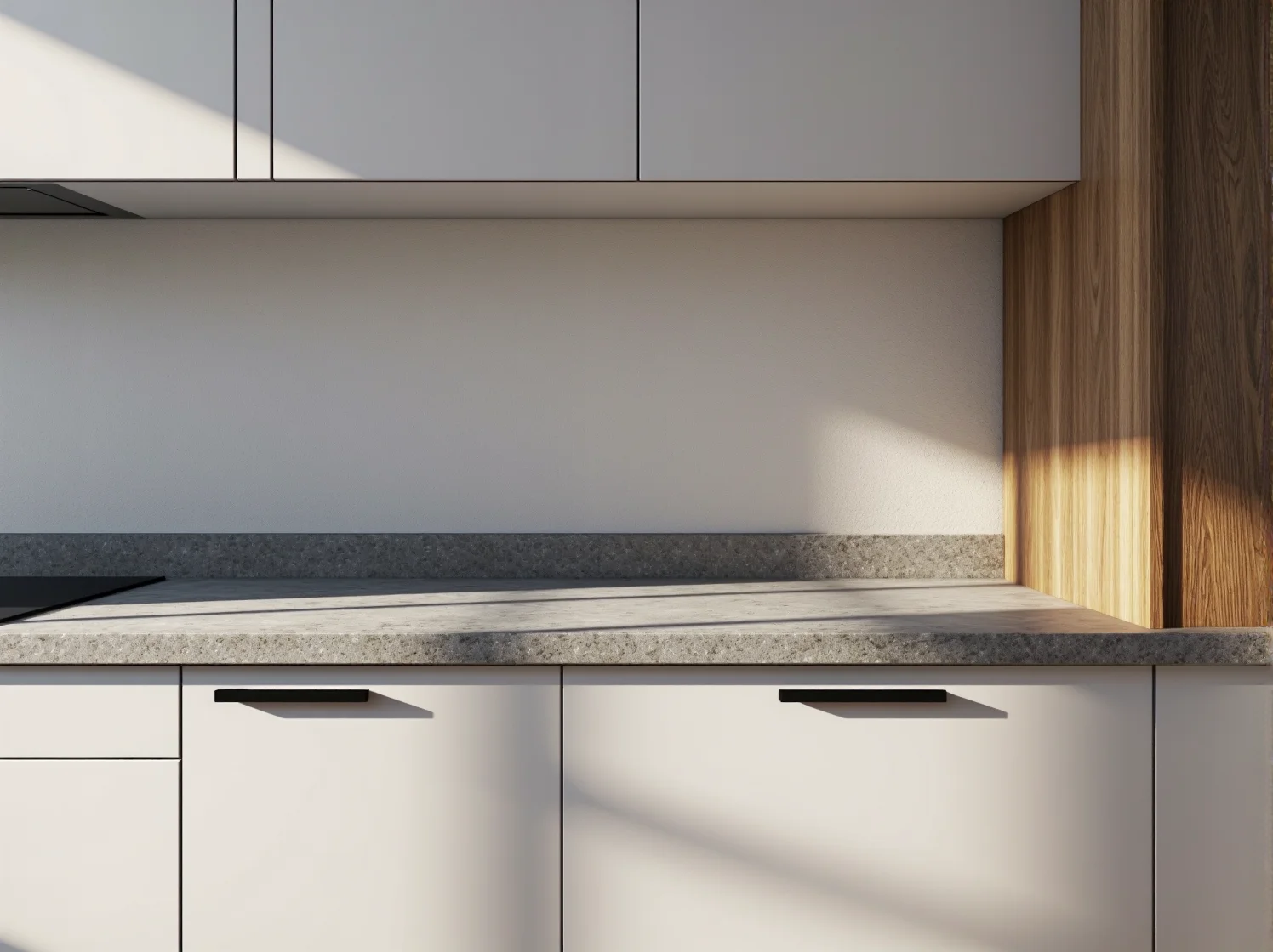 Jasna aranżacja wąskiej kuchni z minimalistycznymi frontami meblowymi bez uchwytów.