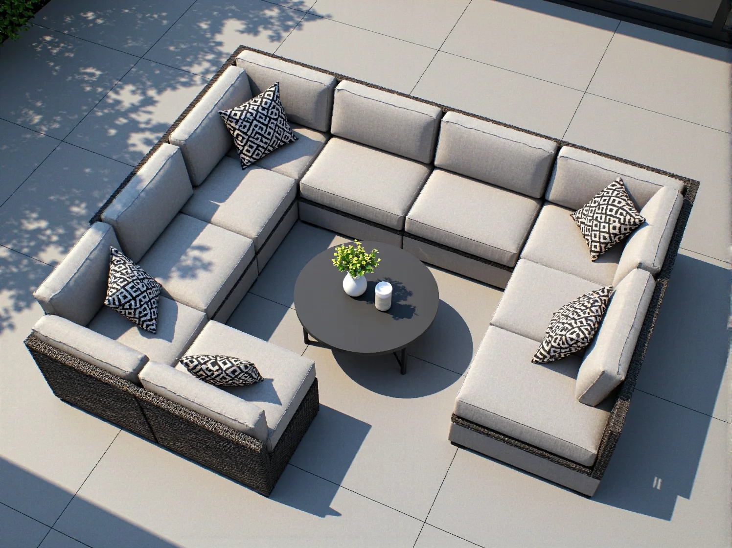 Zestaw mebli wypoczynkowych na taras z miękkimi poduszkami – komfortowy relaks.